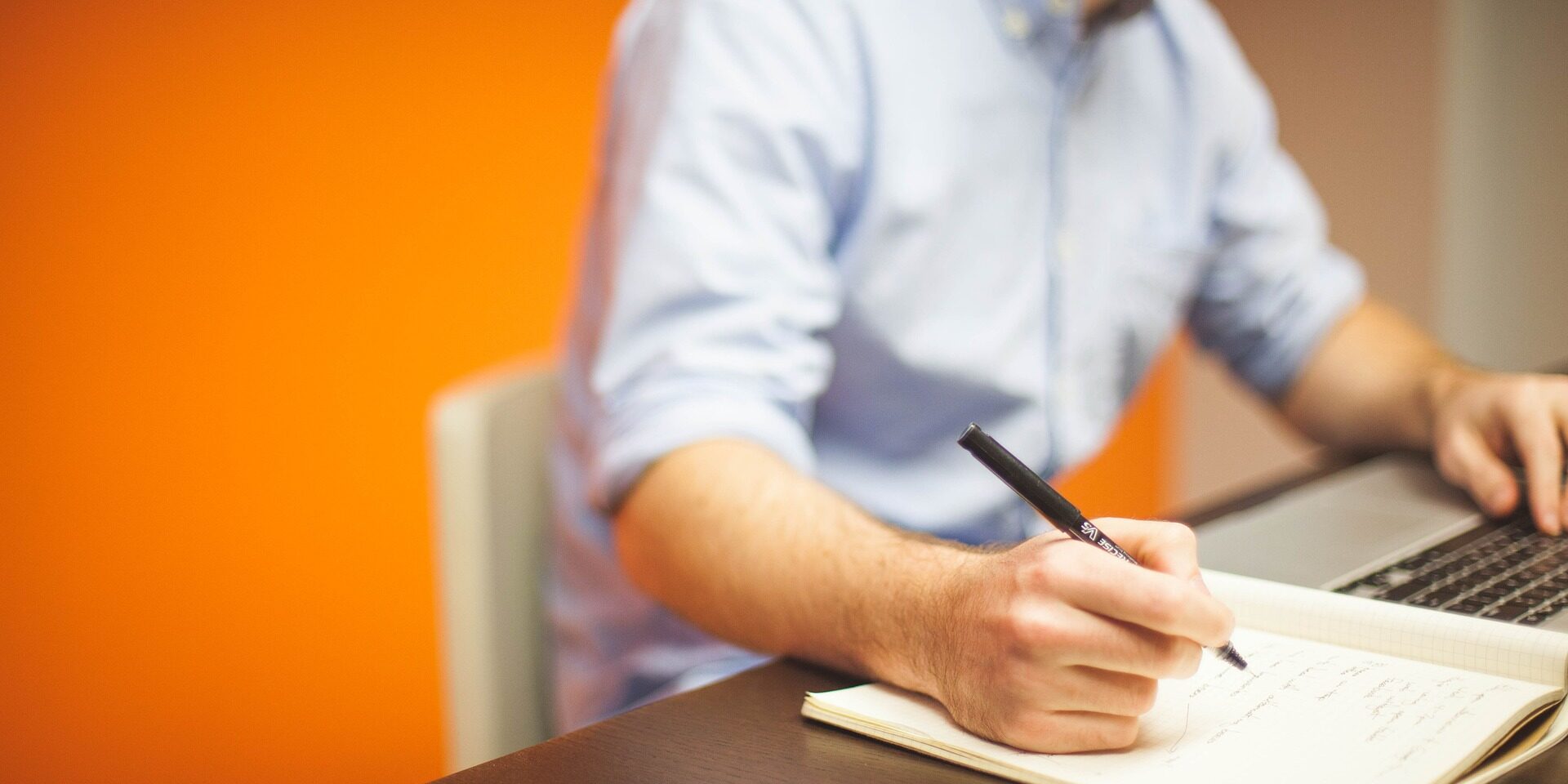 Man sitting at his desk working