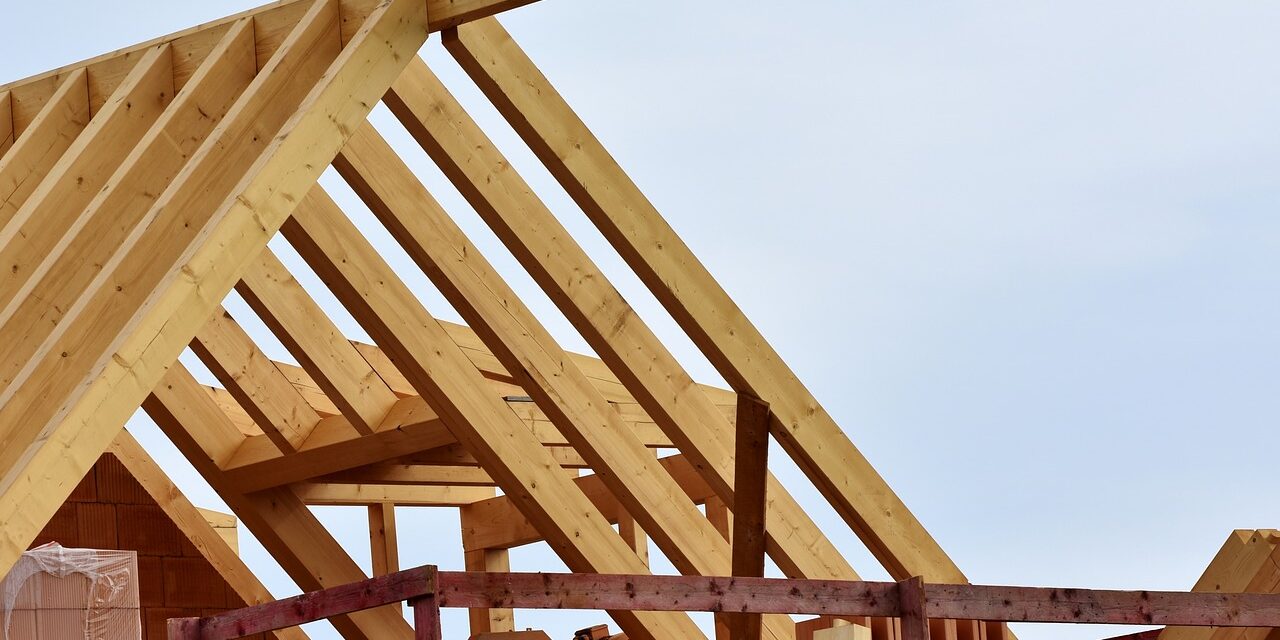 Housing being built showing the timbers of the roof